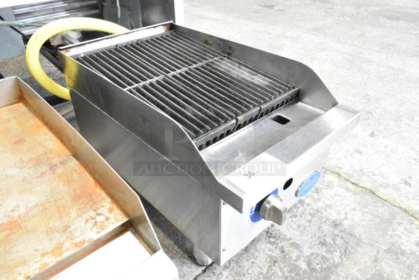 Globe stainless steel gas charbroiler grill, commercial countertop model, visible controls, good condition.