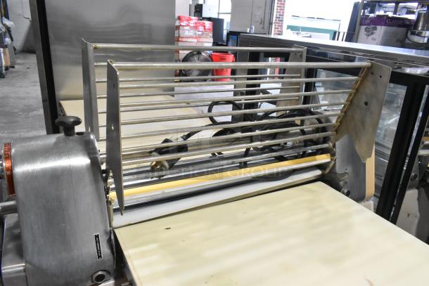 Seewer Rondo SS063C dough sheeter, metal, commercial reversible floor model, 250 volts, used condition, visible power cord.