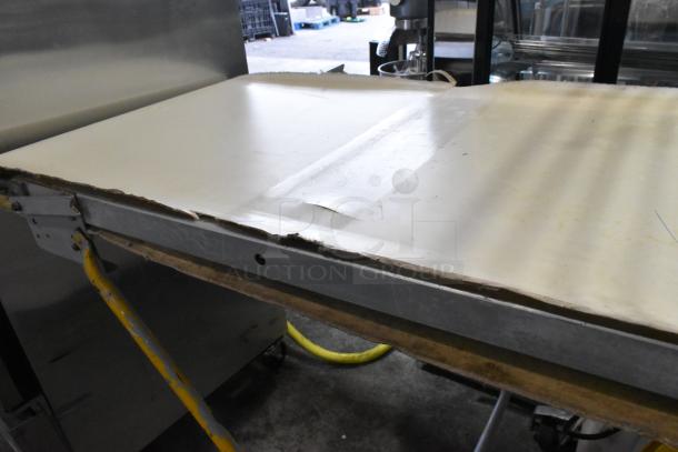 Seewer Rondo SS063C metal commercial dough sheeter, floor style, reversible, 250 volts, signs of wear on the surface.