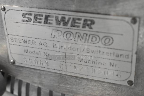 Seewer Rondo SS063C commercial dough sheeter, metal build, floor style, reversible. Label shows model and serial number.
