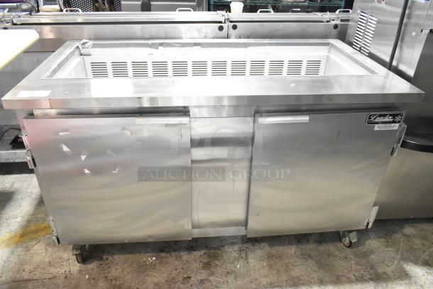 Leader ESLM60S/C stainless steel commercial prep table on casters. Features include 115 volts, 1 phase. Good condition.