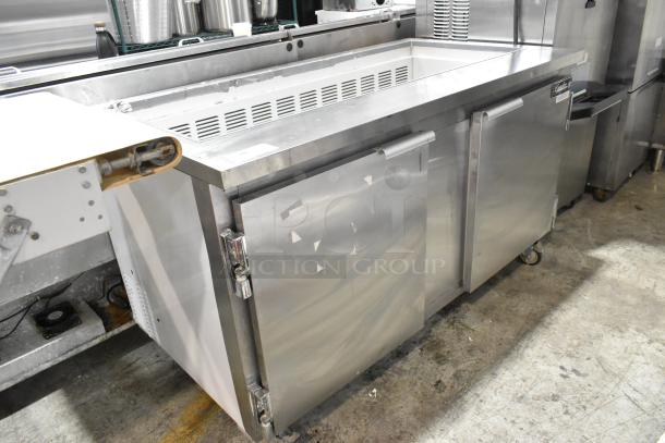 Leader ESLM60S/C stainless steel commercial prep table on casters, 115V, 1 phase, features dual doors, in good condition.