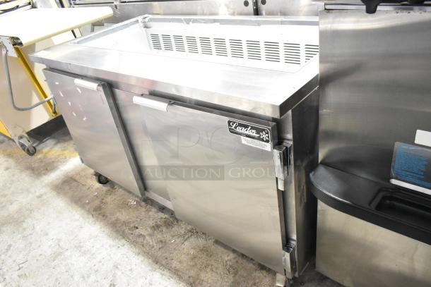 Leader ESLM60S/C stainless steel commercial prep table with two doors, on casters. Operates at 115 volts, 1 phase.