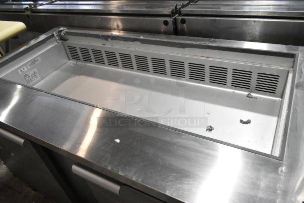Leader ESLM60S/C stainless steel commercial prep table with casters, 115V, 1 phase, visible wear.