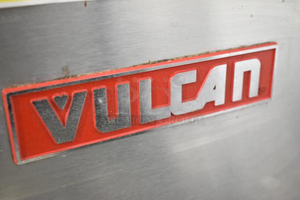 Vulcan VHX24G-AAP steam cabinet, stainless steel, 2 decks, natural gas, 270,000 BTU, red Vulcan logo, commercial use.