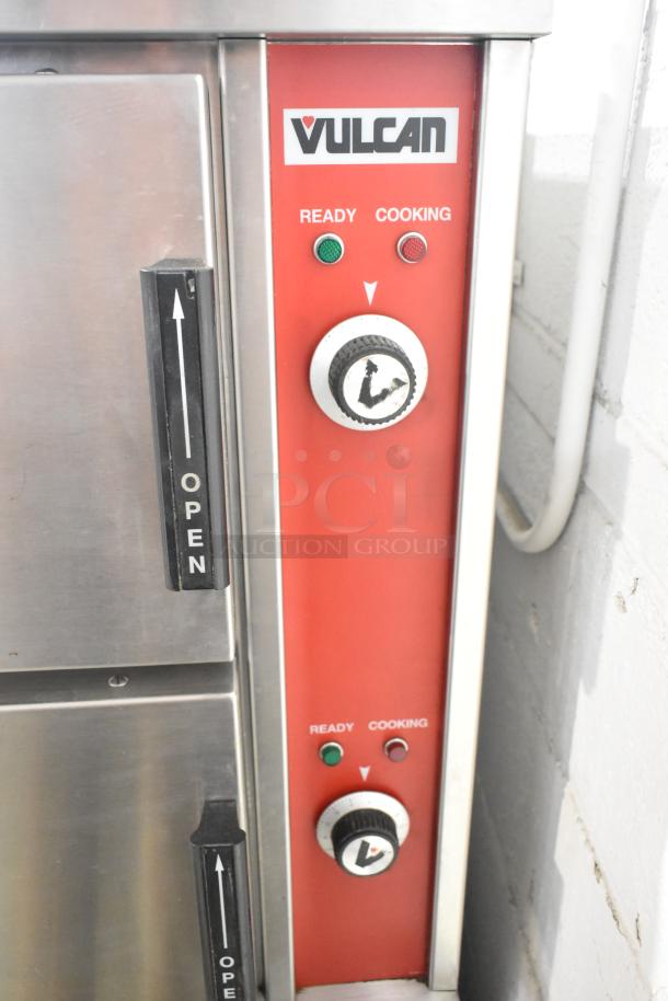 Vulcan VHX24G-AAP stainless steel commercial steam cabinet, natural gas, 270,000 BTU. Features control panel and open lever.
