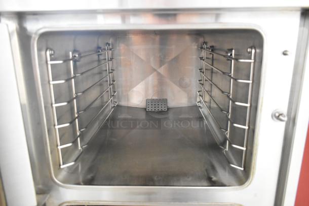 Vulcan VHX24G-AAP stainless steel steam cabinet interior, showing clean, spacious, dual-deck design. Natural gas, 270,000 BTU.