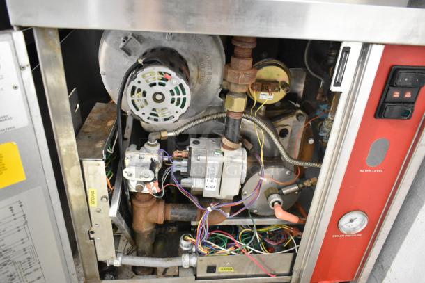 Vulcan VHX24G-AAP stainless steel steam cabinet interior, showing natural gas components and wiring. 270,000 BTU, 2 deck.