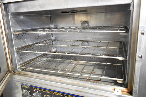 Nu Vu SUB-123 stainless steel commercial oven proofer, 208V, 3 phase, with visible dials and shelves, on casters.