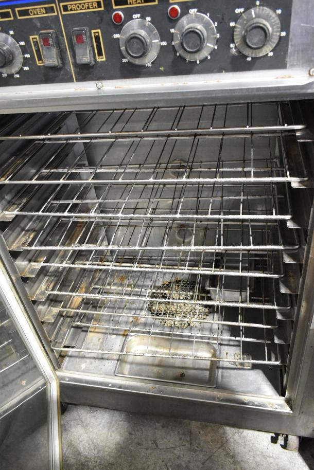 Nu Vu SUB-123 stainless steel commercial oven proofer on casters, 208V, 3-phase. Visible dials, interior racks. Used condition.