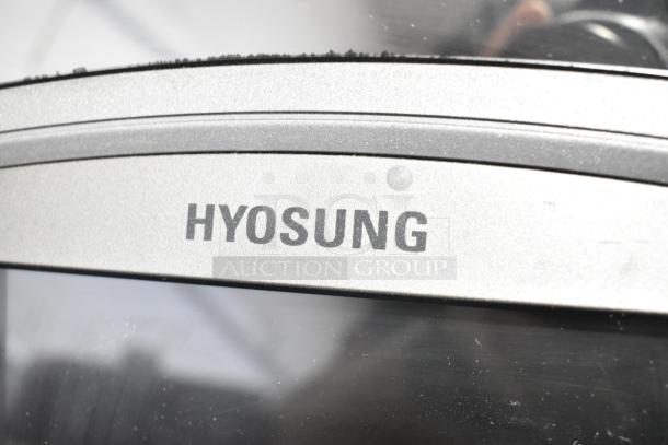 Hyosung Metal Floor Style ATM, close-up of "Hyosung" label, emphasizing brand visibility and durability.