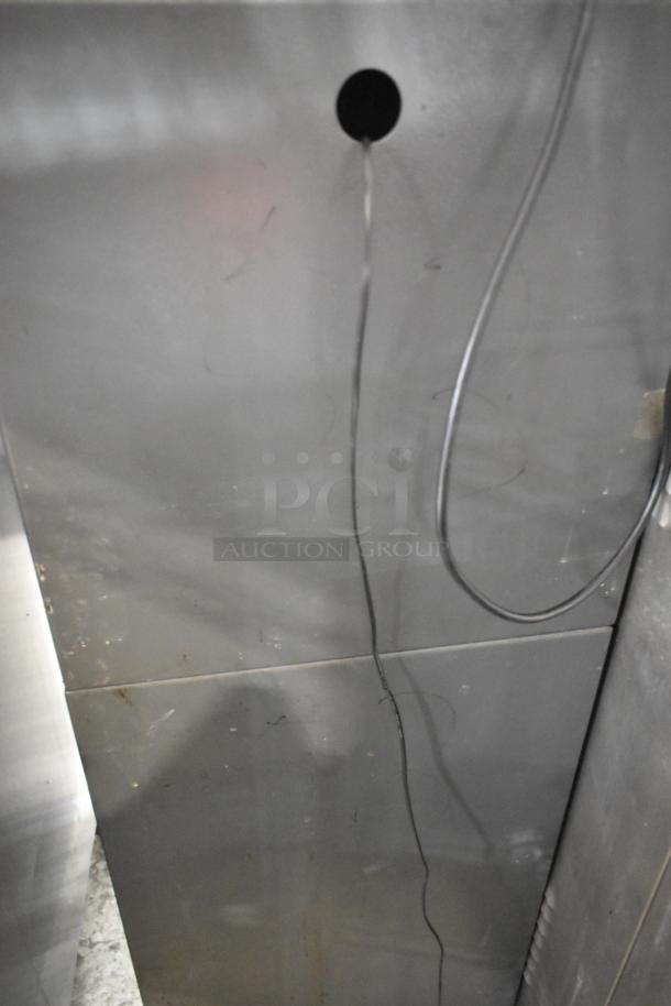 Hyosung metal floor style ATM in used condition, showing metal surface and wiring. Suitable for commercial use.