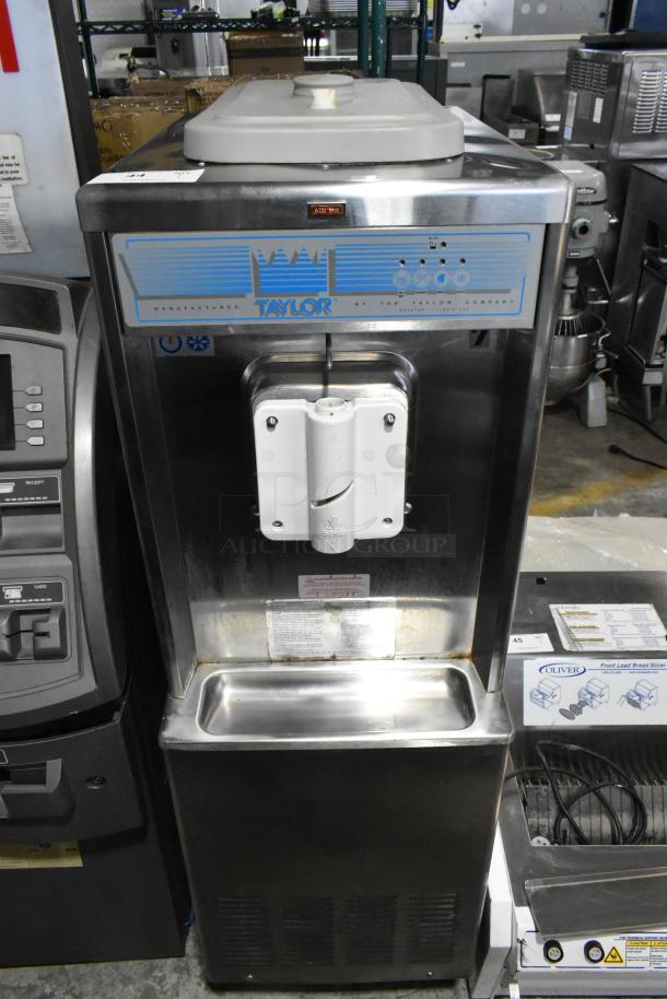 Taylor 441-27 stainless steel single flavor soft serve ice cream machine, water-cooled, on casters, 208-230V, 1 phase.