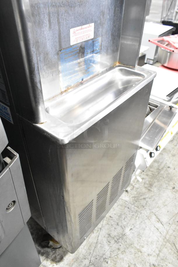 Taylor 441-27 stainless steel single flavor soft serve ice cream machine, water-cooled, on casters. Good condition.