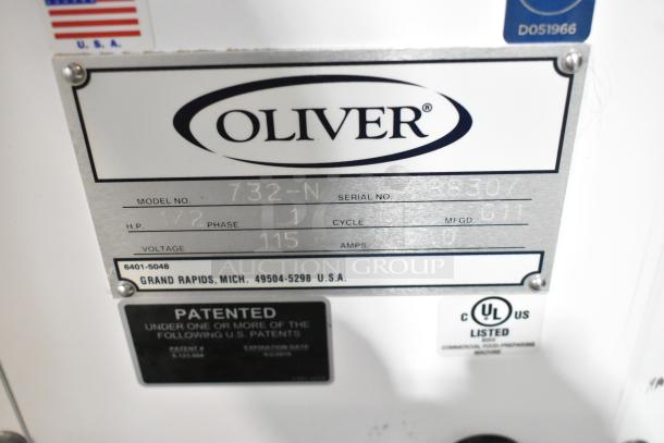 Oliver 732-N metal commercial countertop bread loaf slicer label showing model, voltage, and UL certification.