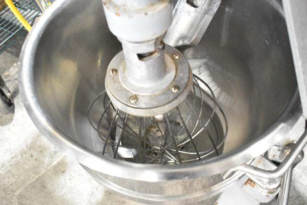 Centaur commercial floor-style planetary dough mixer with stainless steel bowl and whisk. Good condition, 208 volts.
