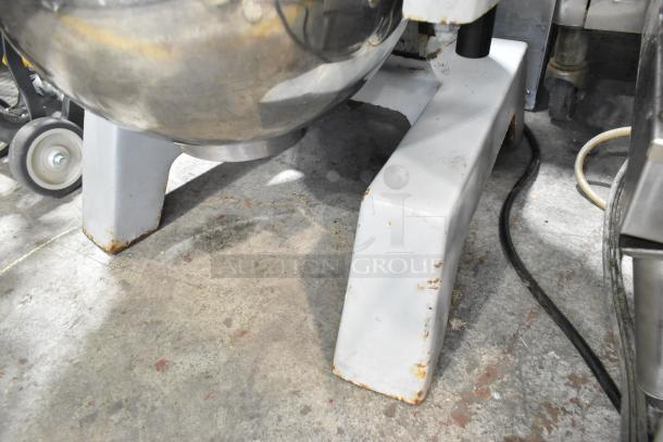 Centaur planetary dough mixer, stainless steel bowl, whisk attachment, visible rust on base, 208V, commercial use.