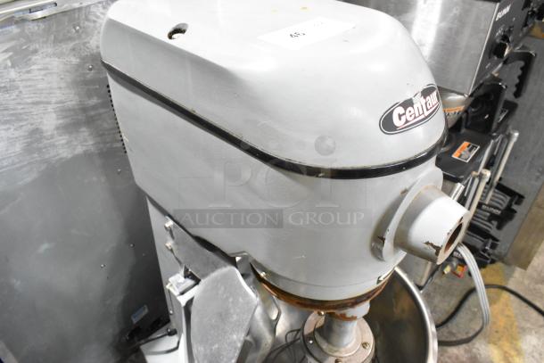 Centaur metal commercial planetary dough mixer with stainless steel bowl and whisk. 208 volts. Visible wear, scratches.