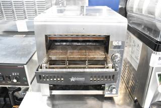 Star Holman QCS-2-80C conveyor toaster oven in stainless steel, used, 208 volts, 1 phase, caution marking visible.