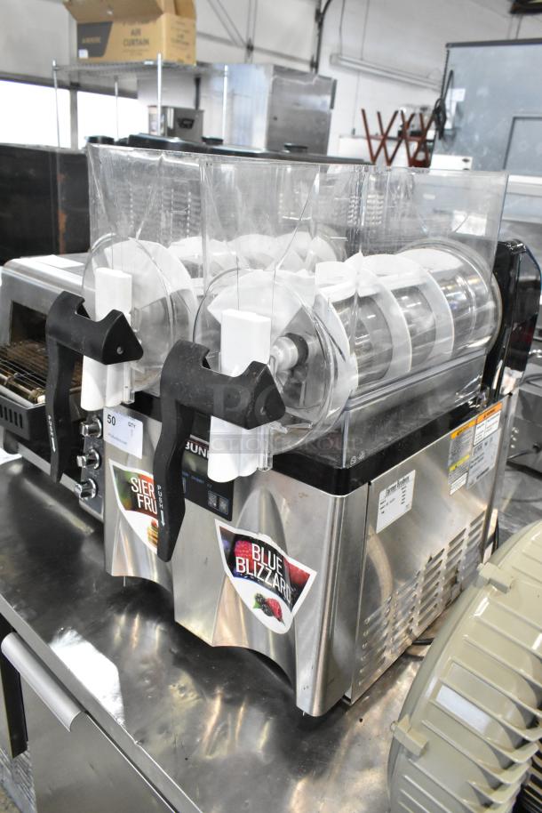 Bunn ULTRA-2 slushie machine, stainless steel, double hopper, no lids, commercial use, model label visible.