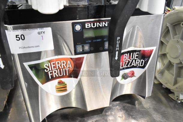Bunn ULTRA-2 stainless steel commercial slushie machine, double hopper, missing lids, front control panel, Sierra Fruit and Blue Lizzard labels.