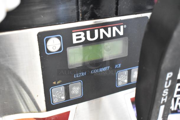 Bunn ULTRA-2 stainless steel countertop slushie machine, no lids, dual hoppers, control panel and buttons visible.