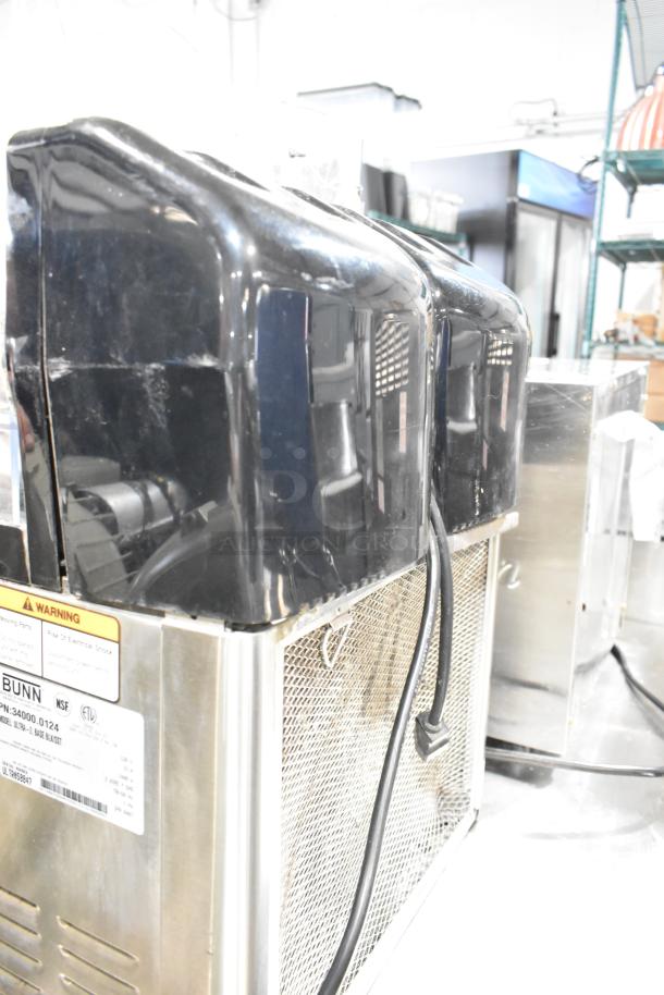 Bunn ULTRA-2 stainless steel slushie machine, dual hoppers, no lids, model label visible, commercial use, fair condition.