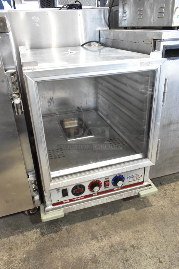 Winholt Metal Commercial Heater Proofer Cabinet in used condition, featuring digital controls, on commercial casters.