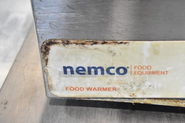 Nemco 6055A stainless steel food warmer, worn label visible, 120V, 1 phase, commercial use, countertop model.