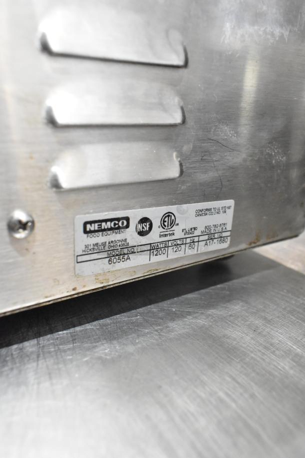 Nemco 6055A stainless steel food warmer with label. Model 6055A, 120 volts, 1 phase. Commercial kitchen use.