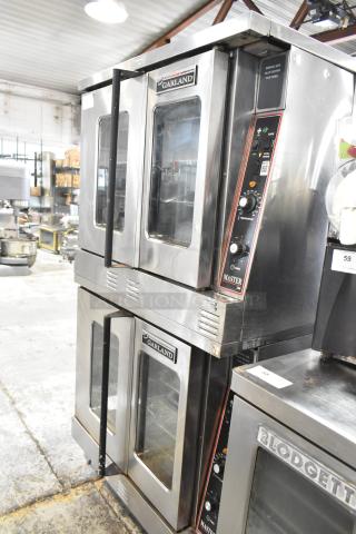2 Garland Master 200 stainless steel convection ovens with view-through doors, metal racks, and thermostatic controls; commercial use.