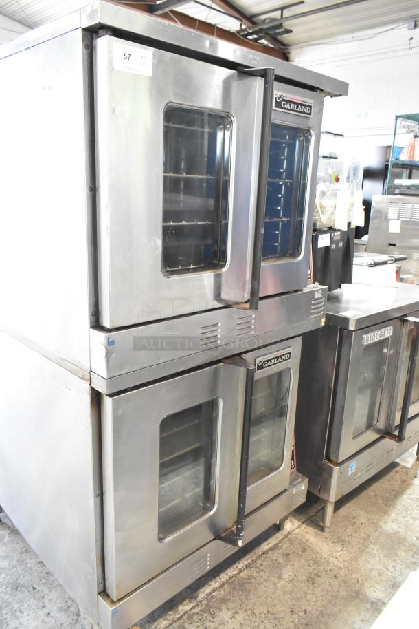 2 Garland Master 200 stainless steel convection ovens with view-through doors, metal racks, and thermostatic controls.