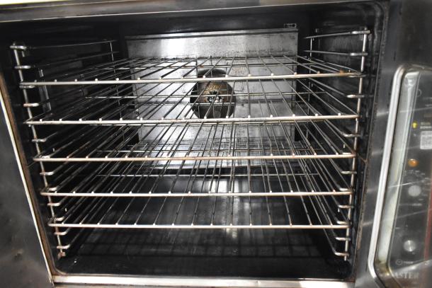 Garland Master 200 stainless steel convection oven with view-through doors, metal racks, and thermostatic controls.