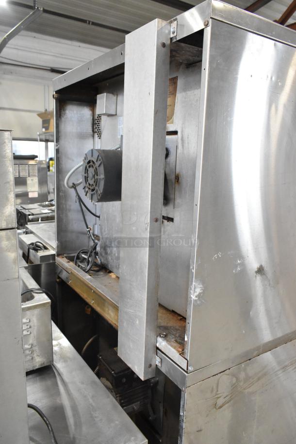 Garland Master 200 stainless steel convection oven backside, showing internal components and wiring, in used condition.