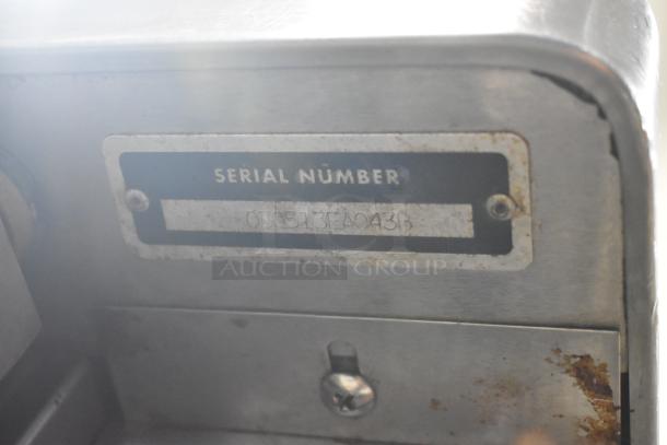 Blodgett stainless steel convection oven serial number plate, slightly worn, showing serial number 030513E4043B.