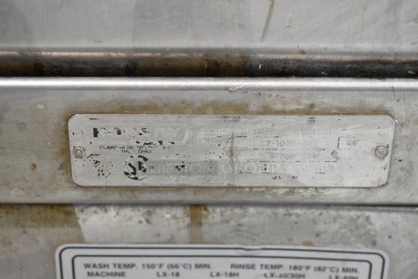 Hobart LX18H stainless steel commercial undercounter dishwasher. Model and voltage details visible on tag.