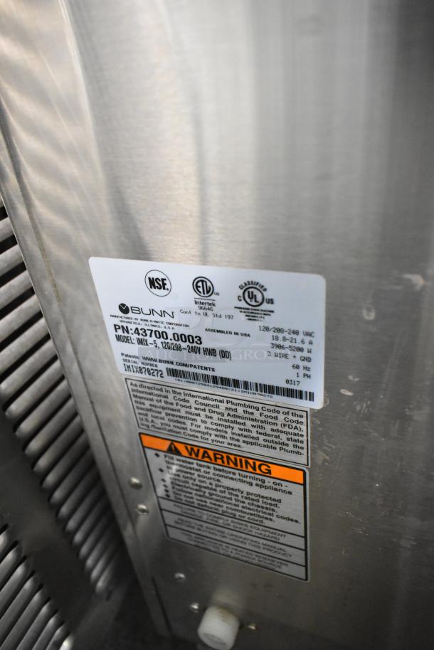 Bunn IMIX-5 stainless steel commercial cappuccino machine, model label showing 120/208-240V, NSF and UL certifications.