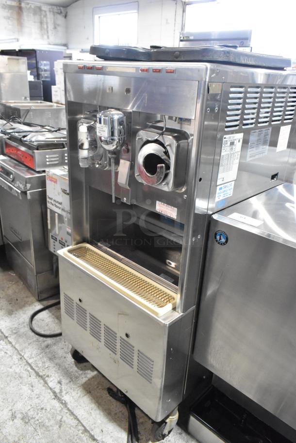 Taylor 342D-27 stainless steel frozen beverage machine, 2 flavors, drink mixer, commercial casters, air-cooled.