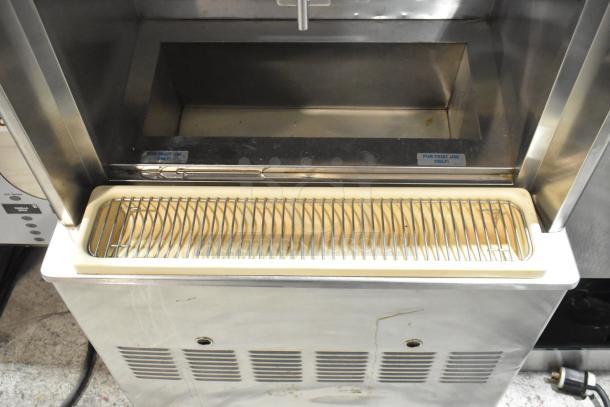 Taylor 342D-27 stainless steel commercial frozen beverage machine with drink mixer, air-cooled, on casters, shows "For Fruit Use Only" label.