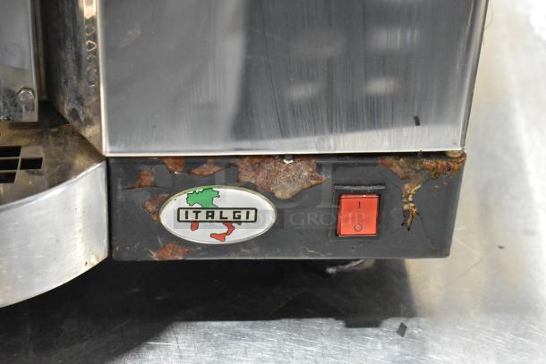 Italgi Cap-o-mat Espresso Machine, 110V, visible wear and rust, Italgi logo, red power switch.