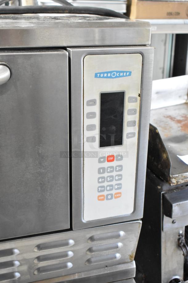 Turbochef NGC Stainless Steel Rapid Cook Oven on stand with casters; features digital display. 208/240V, 1 Phase.