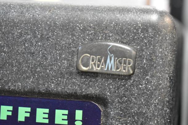 Creamiser 210 Metal Commercial Countertop Dairy Dispenser, 110V, 1 Phase, with "Creamiser" logo visible, textured surface.