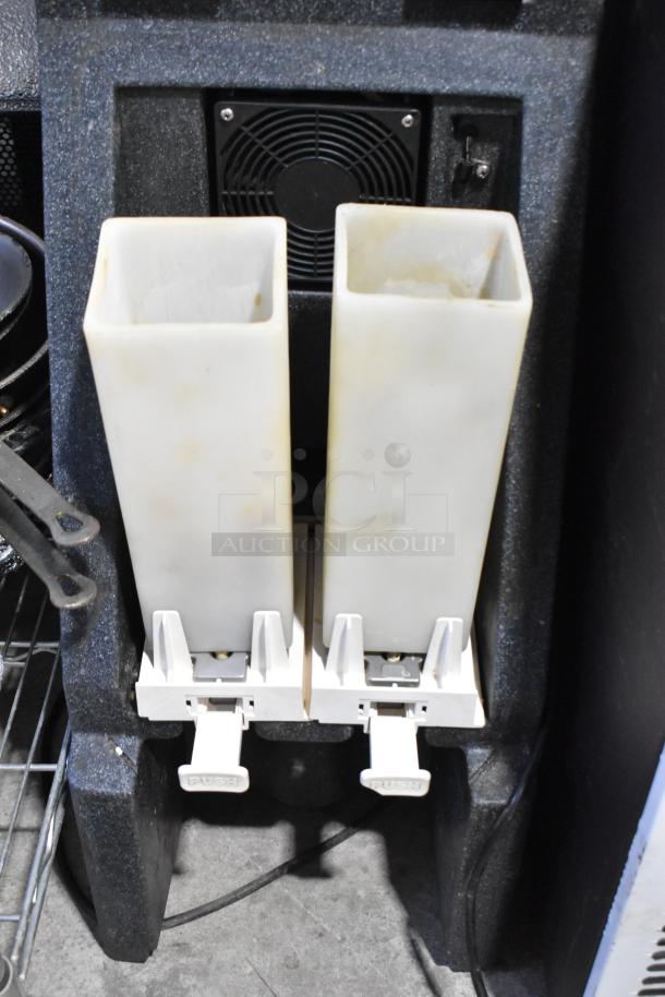 Creamiser 210 Metal Commercial Dairy Dispenser, 110V, 1 Phase, dual compartments, countertop model, used condition.