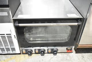 Vollrath COA 7002 stainless steel commercial countertop convection oven, electric, 120V, control knobs, glass door.