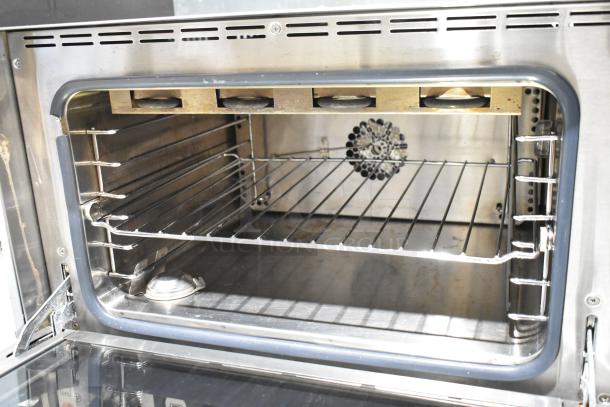 Vollrath COA 7002 stainless steel commercial convection oven, electric, countertop model, 120 volts, clean interior.