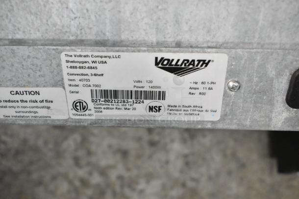 Vollrath COA 7002 stainless steel convection oven label, model 40703, 120V, 1400W, 1 Phase, made in South Africa.