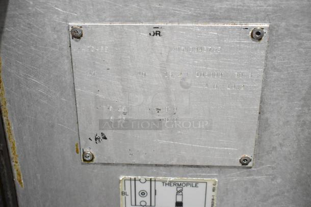 Pitco Frialator 40C fryer label showing 105,000 BTU and natural gas specifications on stainless steel plate.