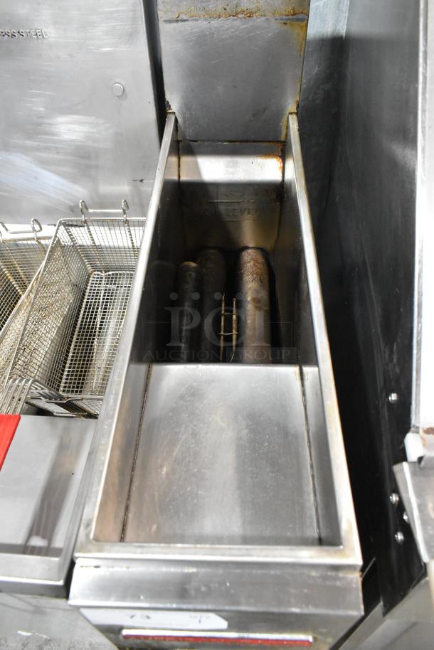 American Range AF-25 stainless steel slimline deep fryer with metal basket, natural gas powered, 160,000 BTU, used condition.