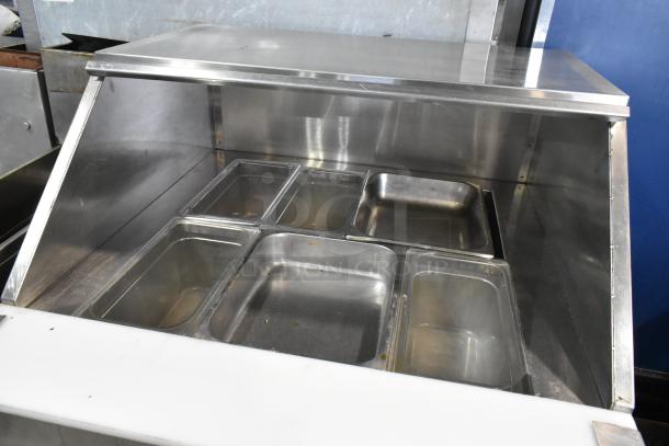 2020 Delfield 18MC32P-BI stainless steel prep table on casters with multiple compartments. 115V, 1 phase.