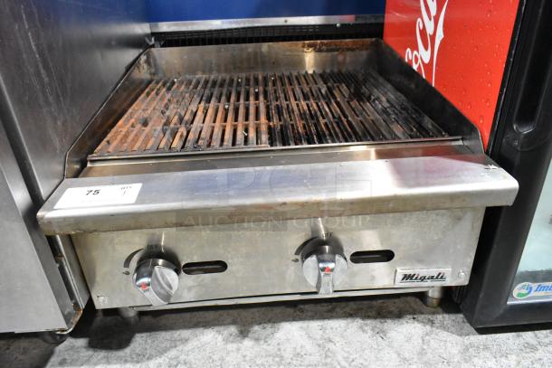 Migali stainless steel gas charbroiler grill, featuring dual controls and a used grate. Model suitable for commercial use.